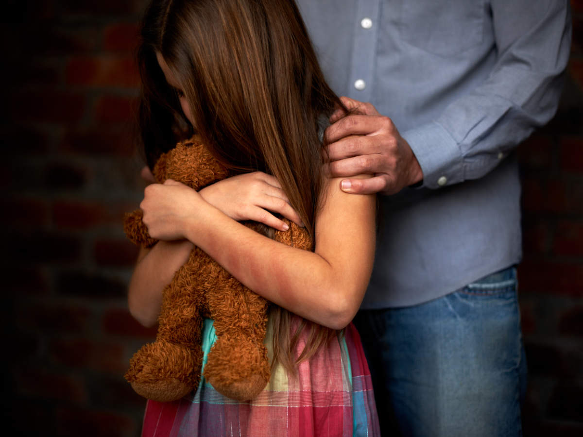 man and little girl